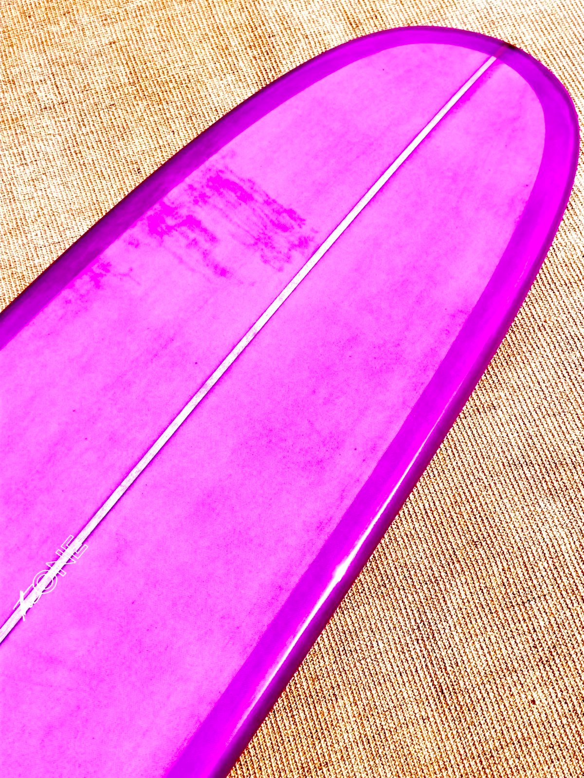 The One | PU | 9’4” | 74.5L | Púrpura Translúcido