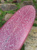 Longboard Lufi One Piece 9'2" seminovo, mauvee: bico pelo deck, com a parafina de uso ainda na prancha.